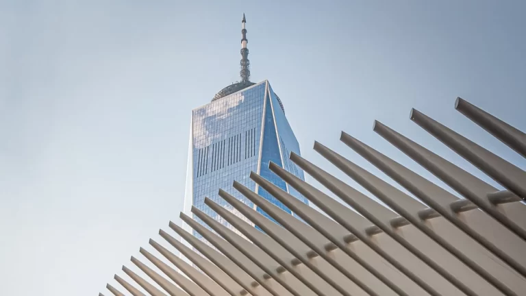 One World Trade Center peeking over the top of the Oculus in New York, New York