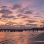Pink and purple sunset at the pier in St. Simons Island, Georgia