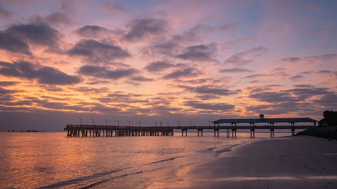 Pink and purple sunset at the pier in St. Simons Island, Georgia